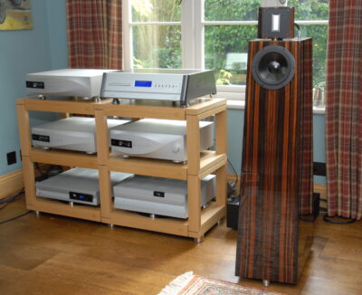 A double-width HiFi rack in Light Oak. CD system by dCS with VTL 7.5 preamp, flanked by a Kaiser Classic speaker